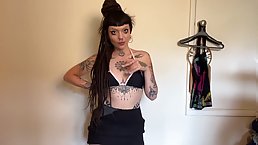 Dark-haired inked girl plays with big dildo