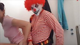 Horror clown fucks brunette teen in the bathroom